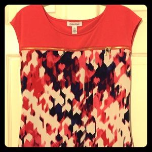 CK casual blouse in a vibrant shade of coral